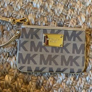 MICHEAL KORS gold wristlet